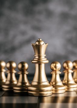 Gold Chess on chess board game for business metaphor leadership concept